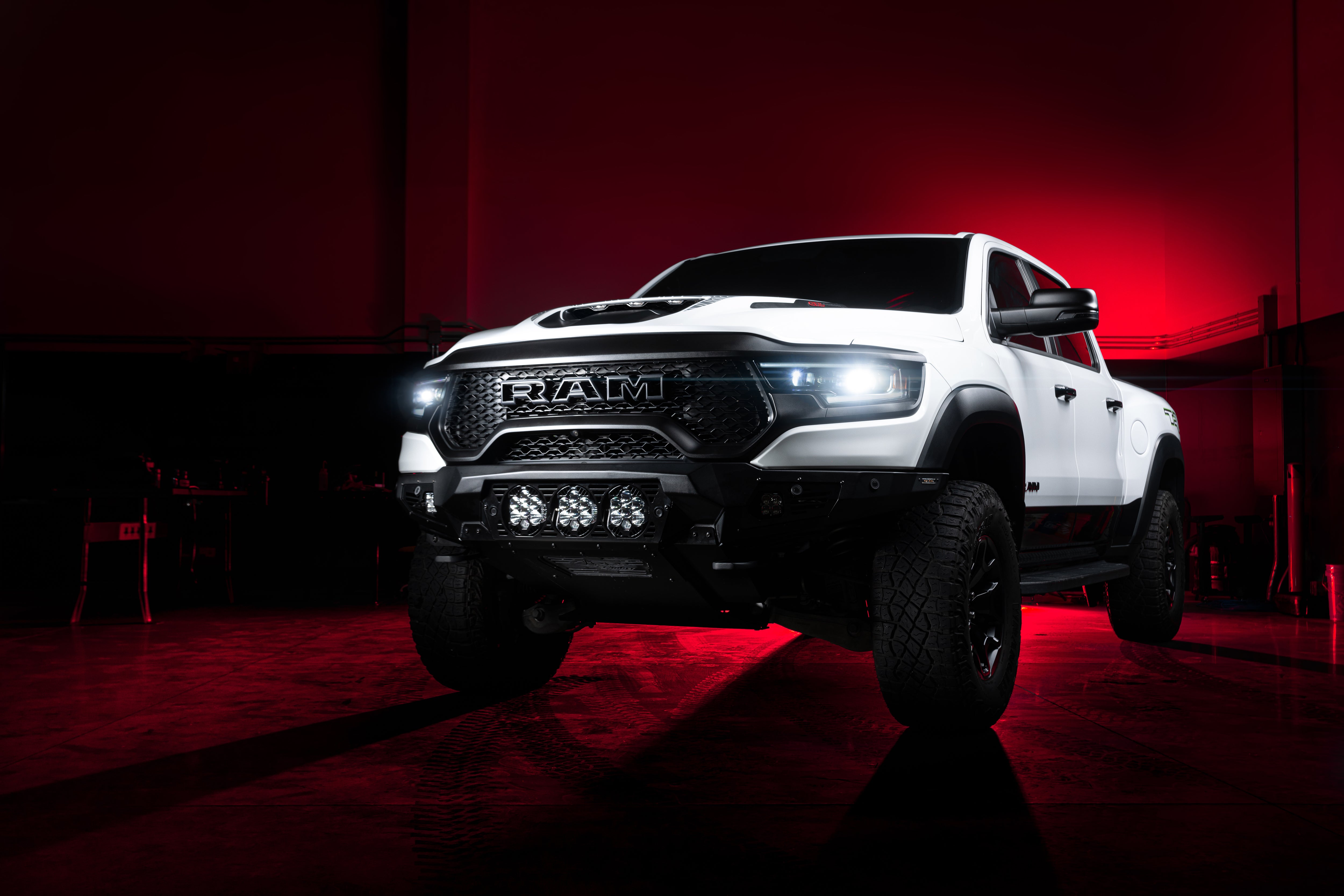 Dodge Ram 1500 TRX Dodge Ram 1500 TRX Clean with Performance stance and red background.